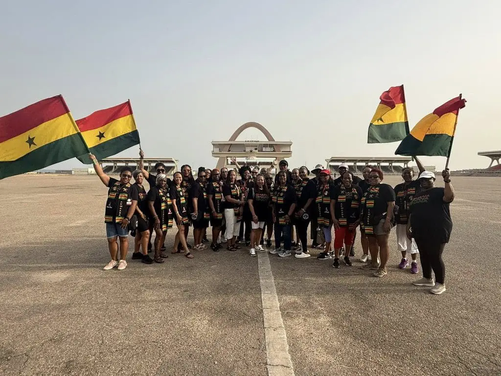 Travel Divas in front of the Independence Arch in Accra, Ghana