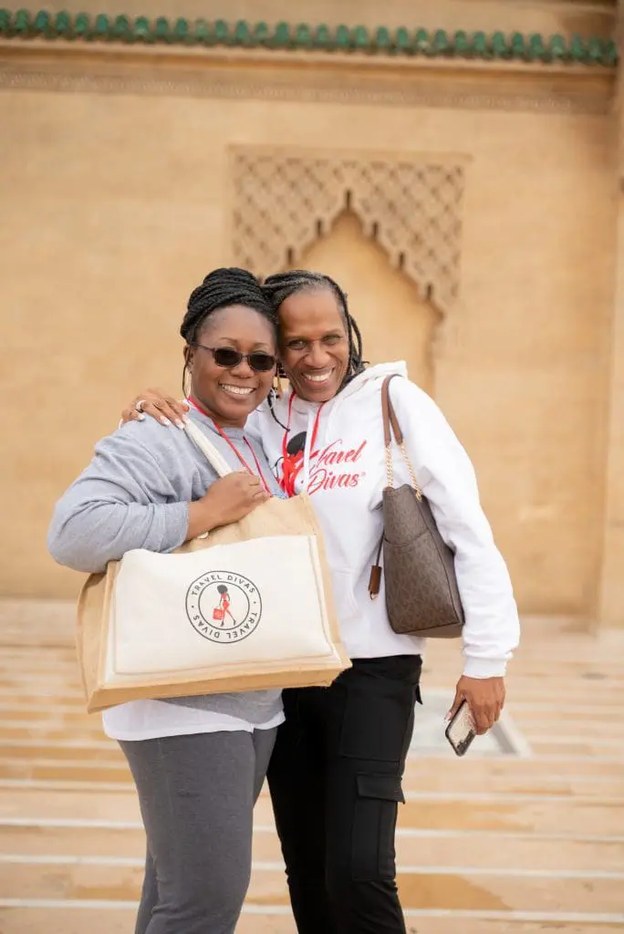 Two travel divas taking a photo in Morocco