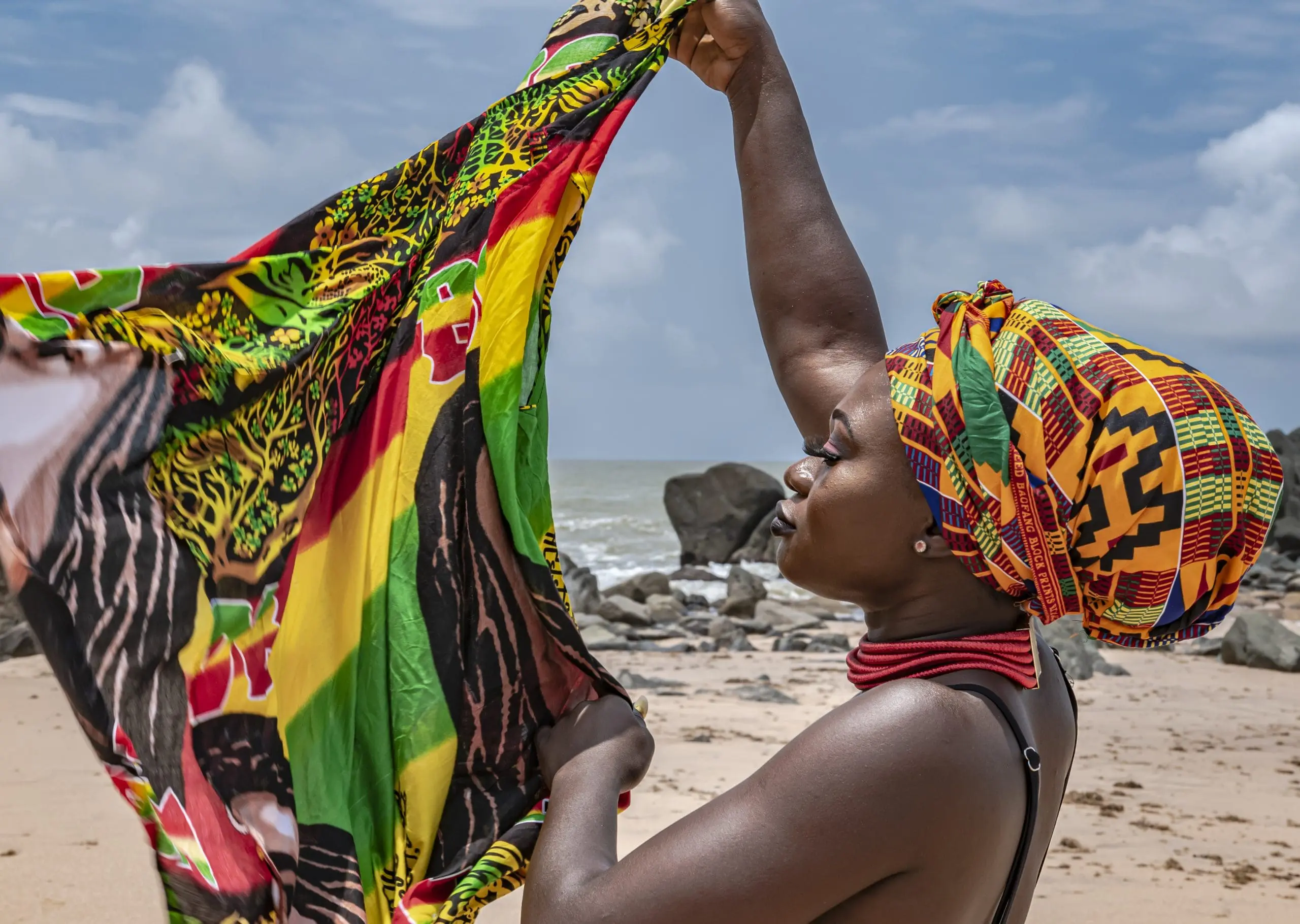 Ghana woman on the beautiful beach of axim located in ghana west africa