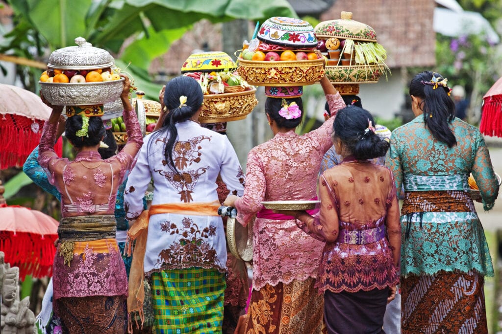 Women carry temple