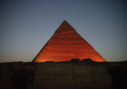 Nightime view of the pyramids in Egypt - Travel Divas