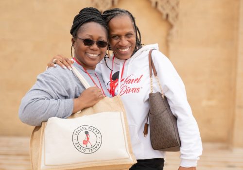 Two travel divas taking a photo in Morocco